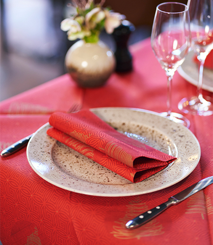 Red Christmas napkin on matching table
